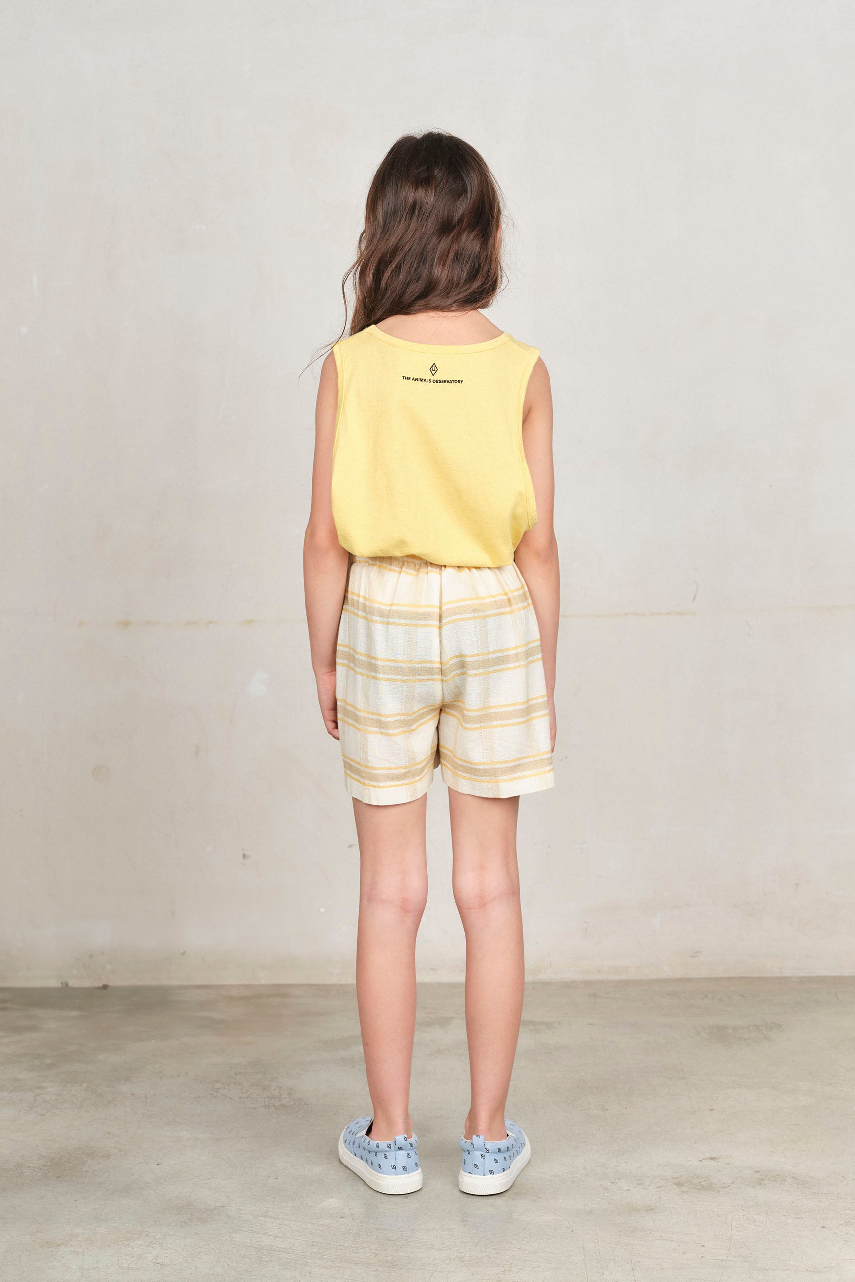 Beige Shield Bee Bermuda Shorts MODEL BACK